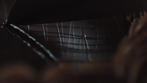 The chef cuts a chocolate cake with a knife and cuts a delicate sweet piece Stock Footage 131230914