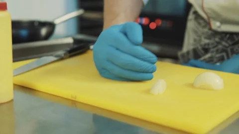The chef cuts a close-up onions Stock Footage 89842564