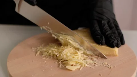 Chef cuts the cocoa butter Stock Footage 157277659