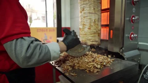 Chef cuts cooked meat Stock Footage 188464520