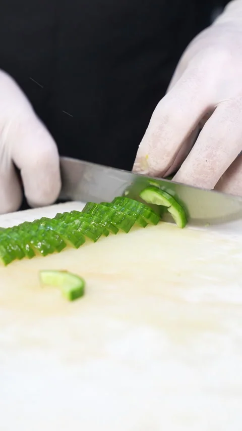 Chef Cuts Cucumber With Knife Stock Footage 296023321