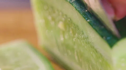 The chef cuts the cucumber into thin slices Stock Footage 55629622