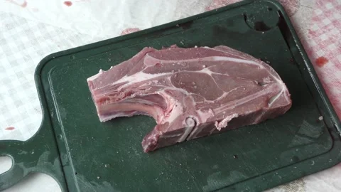 The chef cuts deer meat with a knife Stock Footage 164348838
