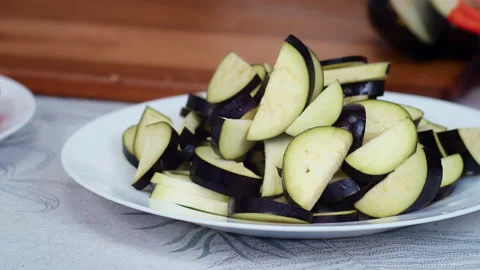 Chef cuts the eggplant Video stock 161154965
