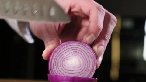 Chef cuts fresh onions with sharp knife slices for making burger. fast food. Stock Footage 146059481