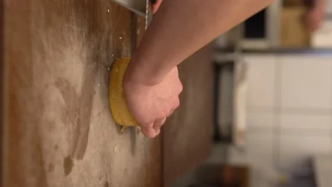 Chef cuts hamburger buns in half -  4k 100 fps - Vertical Stock Footage 194354356
