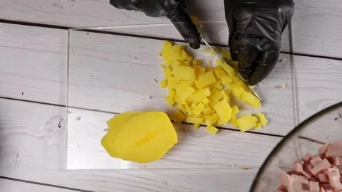 The chef cuts large potatoes for the olivier salad. High quality 4k footage Vidéo 291683472