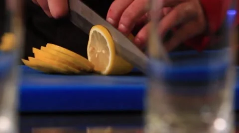 Chef cuts the lemon Stock Footage 49314421