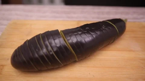 Chef cuts long eggplant (2) Video stock 202166783