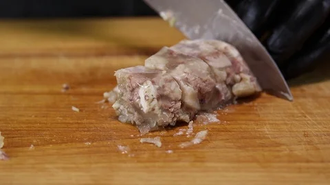 Chef cuts meat jelly Stock Footage 122995194
