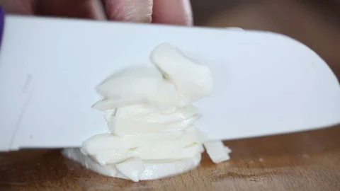The chef cuts mozzarella. Stock Footage 91729754