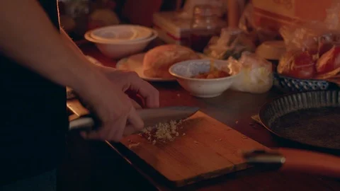The chef cuts the mushrooms Stock Footage 117940444
