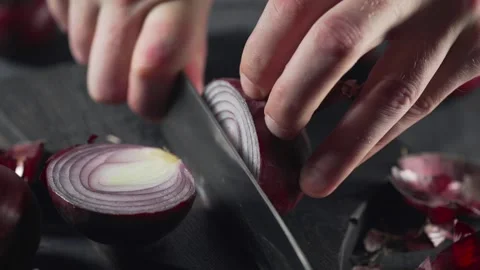 Chef cuts onion the cook makes salad Stock Footage 143777087