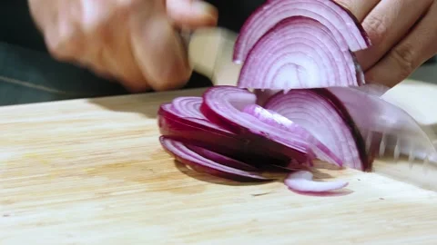Chef cuts the onion slow motion Video stock 153766754