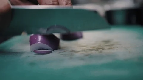Chef cuts onions with a sharp knife Stock Footage 112589567