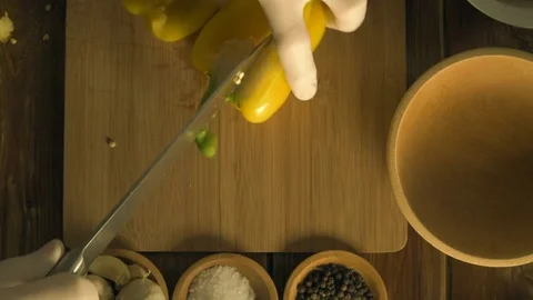 The chef cuts paprika on salad Stock-Footage 74259207