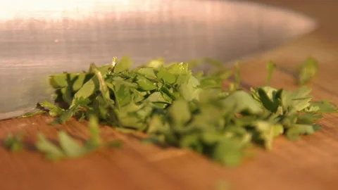Chef cuts parsley for salad Stock Footage 158021785