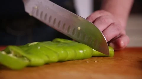Chef cuts pepper and green pepper (2) Stock Footage 202206025