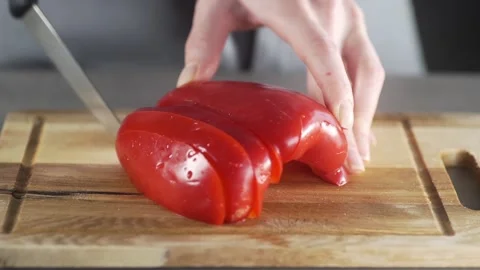 Chef cuts peppers for making vegetable dish fresh vegetable salad Stock Footage 143777166