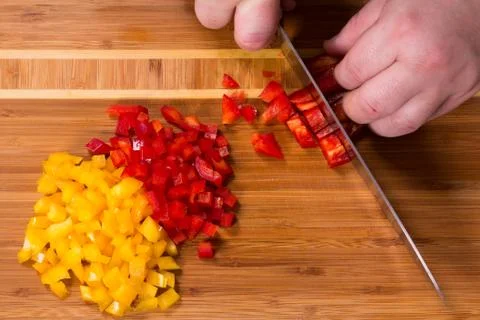 The chef cuts the peppers Stock Photos