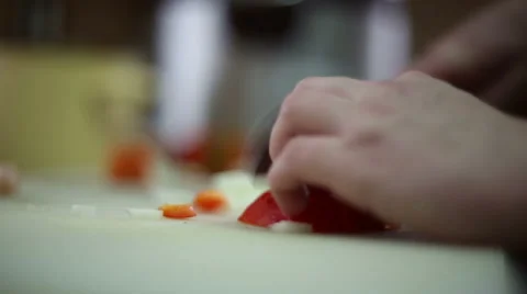 The chef cuts into pieces of bell pepper Stock Footage 59698772
