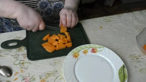 The chef cuts the pumpkin with a knife Stock Footage 139131760