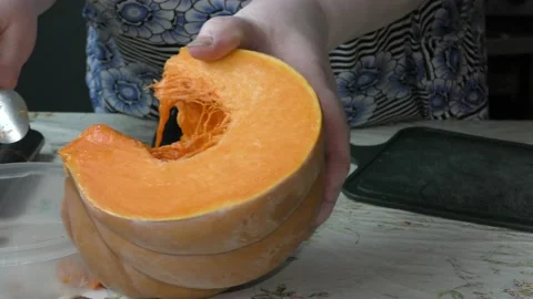 The chef cuts the pumpkin with a knife Stock Footage 139132861