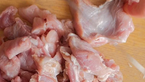 The chef cuts raw meat with the knife Video stock 88713927