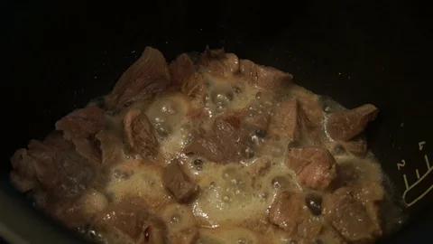 The chef cuts raw meat with the knife. Chef cutting pork meat. Cutting meat Stock Footage 99742986