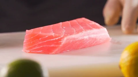 Chef cuts red fish, the most delicious meat Stock Footage 116686632
