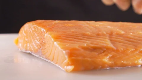 Chef cuts red fish, the most delicious meat Stock Footage 116686662