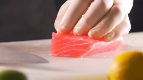 Chef cuts red fish, the most delicious meat Stock Footage 116686818