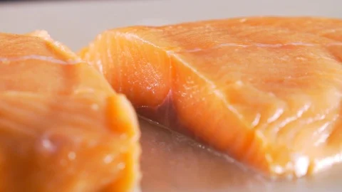 Chef cuts red fish, the most delicious meat Stock Footage 116687026