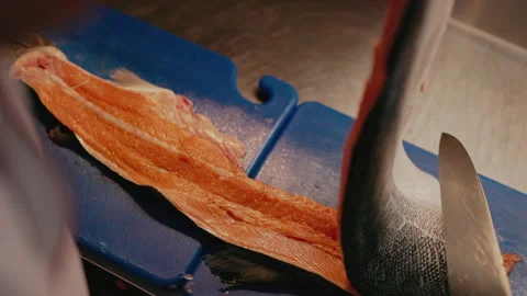 Chef Cuts Red Fish. Process Of Separating Fish In Restaurant. Stock Footage 262670812