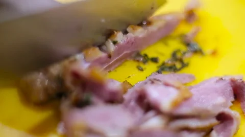 Chef cuts the roast duck breast Stock Footage 67864346
