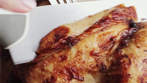 Chef cuts the roasted chicken, chopping tasty grilled chicken. 스톡 동영상 309519431