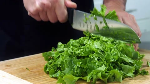Chef cuts the salad Video stock 220280651