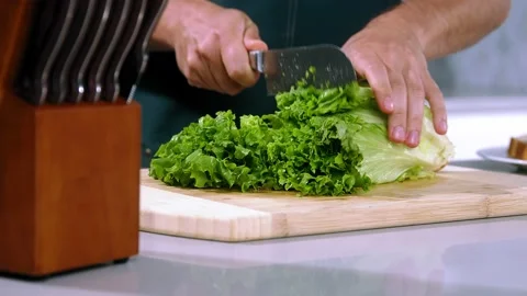 Chef cuts the salad Stock-Footage 221850135