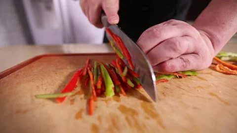 Chef cuts shredded green and red pepper (3) Stock Footage 202166674