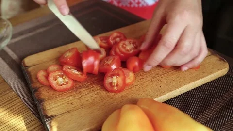 Chef cuts the tomato Stock Footage 78802176