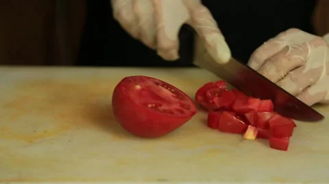 Chef Cuts Tomato On Table Stock Footage 65481403