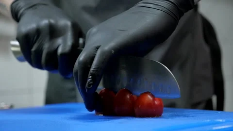Chef Cuts Tomatoes Stock Footage 131627881