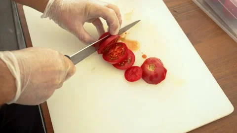 The chef cuts the tomatoes Stock Footage 169982287