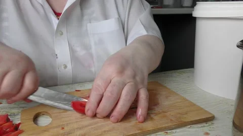 The chef cuts the tomatoes with a knife Stock Footage 138719807