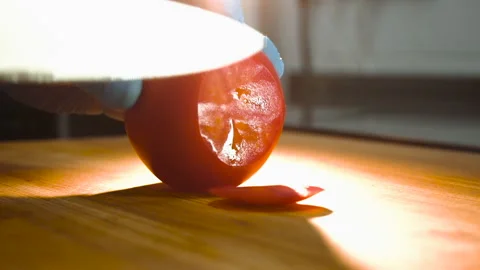 Chef cuts tomatoes for salad Stock Footage 158021634