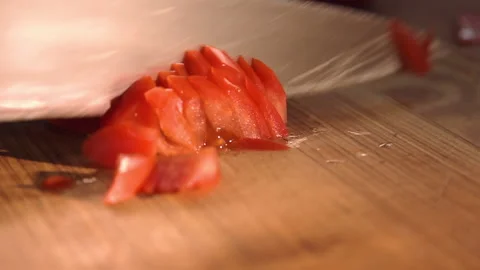 Chef cuts tomatoes for salad Stock Footage 158021708