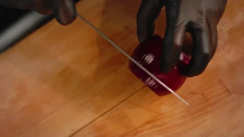 The chef cuts vegetables in the kitchen. Close up Stock Footage 131152075