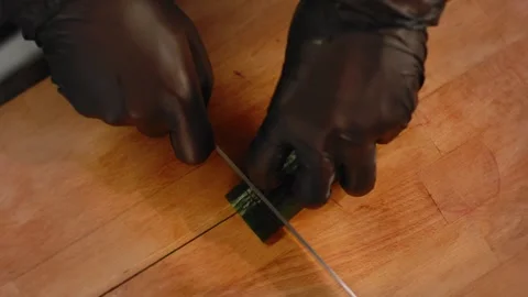 The chef cuts vegetables in the kitchen. Close up Stock Footage 131152091