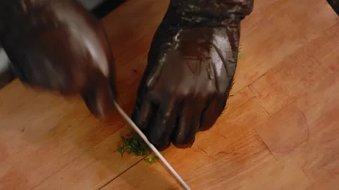 The chef cuts vegetables in the kitchen. Close up Stock Footage 131152092