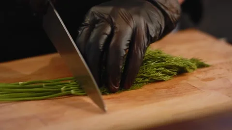 The chef cuts vegetables in the kitchen. Close up Stock Footage 131152107